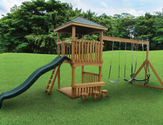 wooden swing set with green accessories in a grassy field