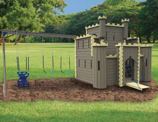 brown Lancelot castle swing set in a grassy field