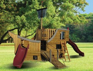 pirate ship playset with a red slide in a grassy field