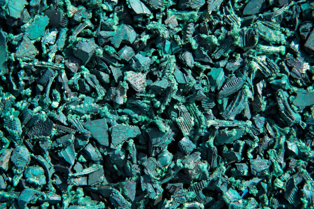 pile of green rubber mulch